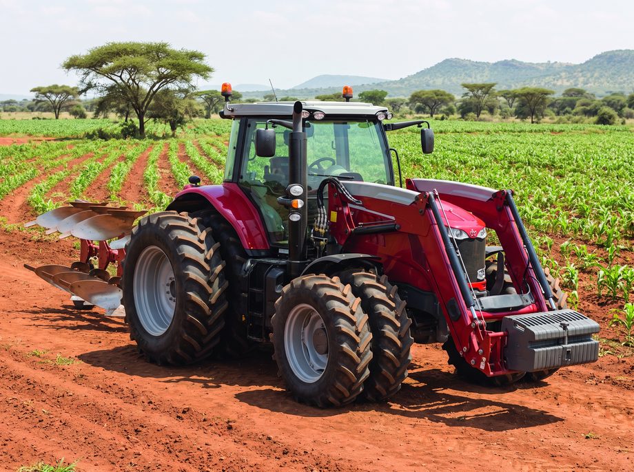 A large heavy-duty tractor in an open field